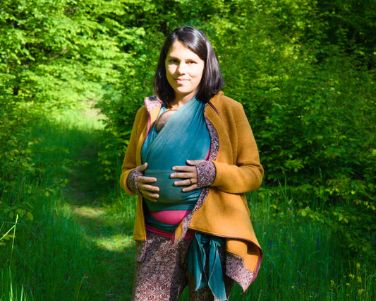 Babywearing hoodie from boiled wool with merino cuffs