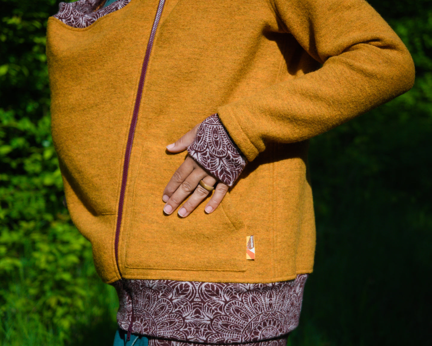 Babywearing hoodie from boiled wool with merino cuffs