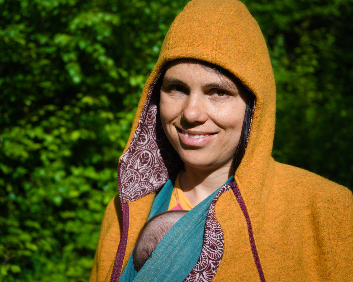 Babywearing hoodie from boiled wool with merino cuffs